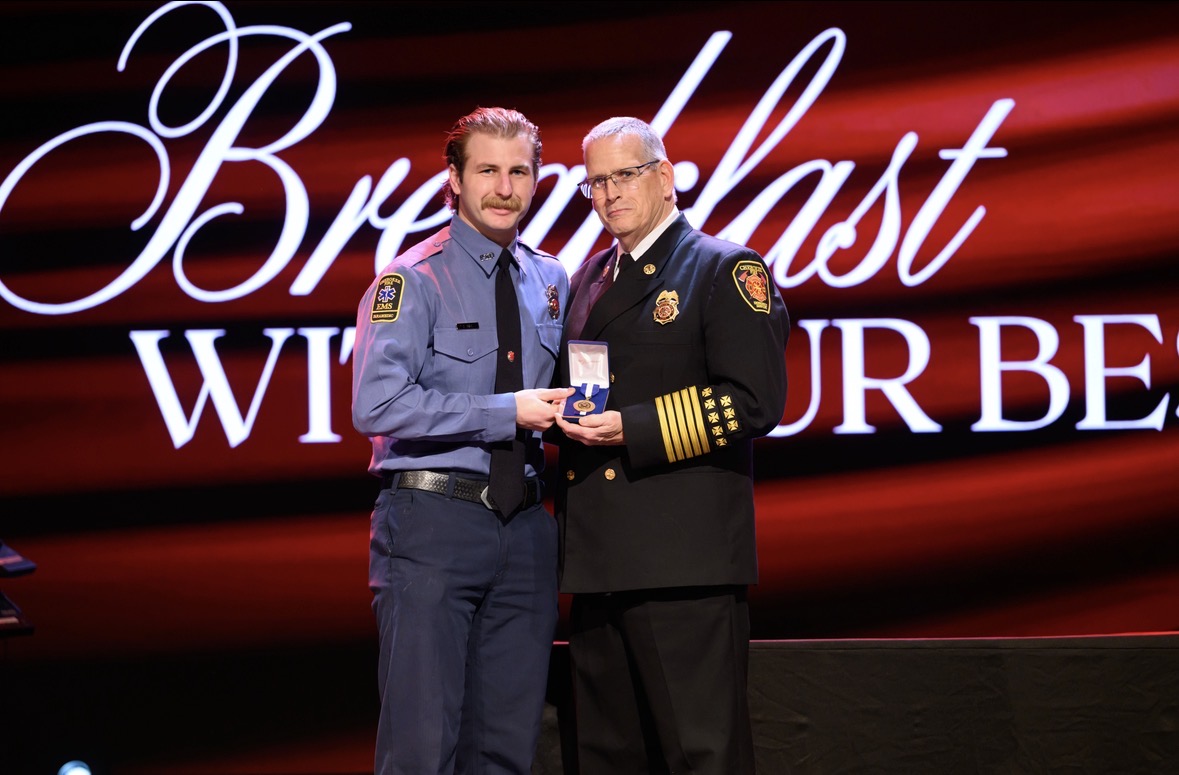 FAO Tate Dill receives his award. 
